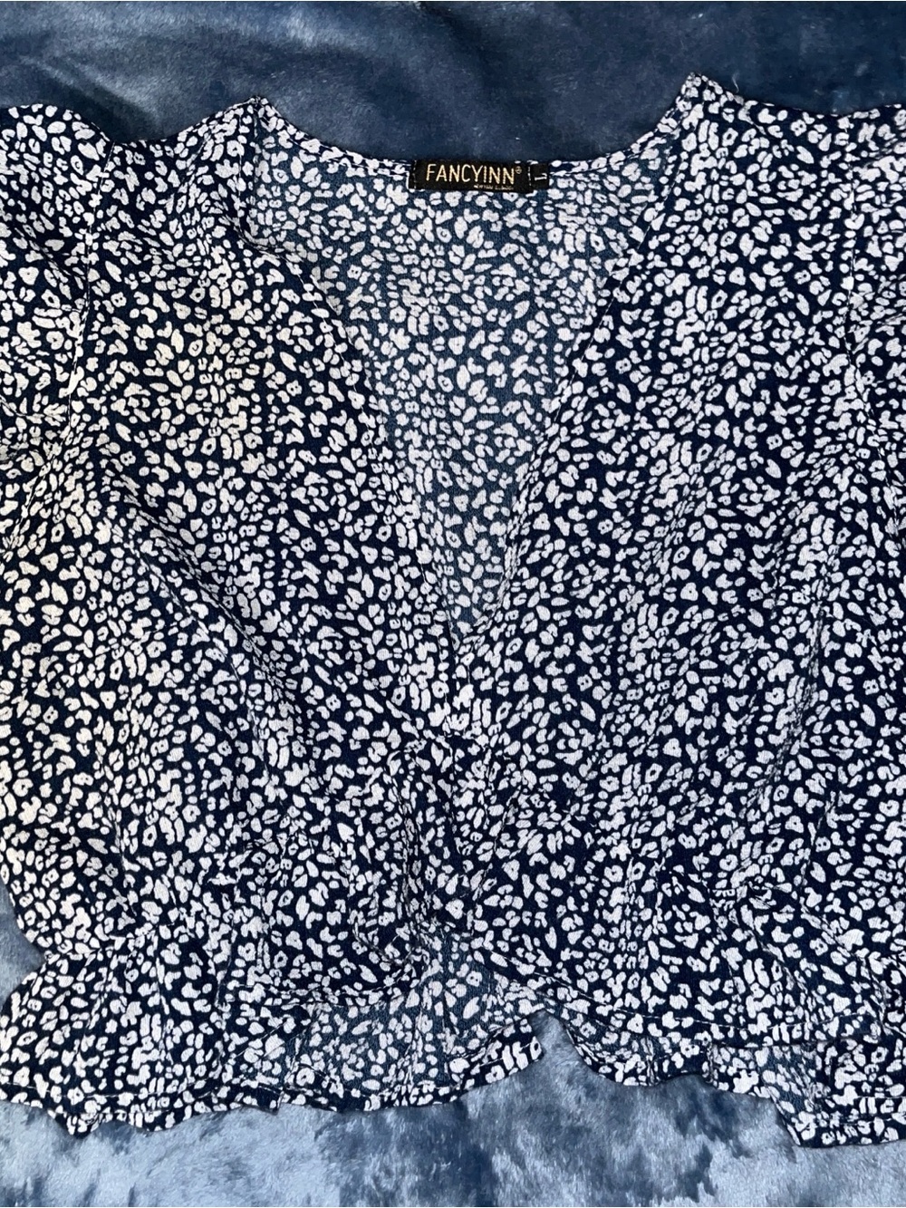 FANCYINN Navy and White Floral-Spot V-Neck Blouse